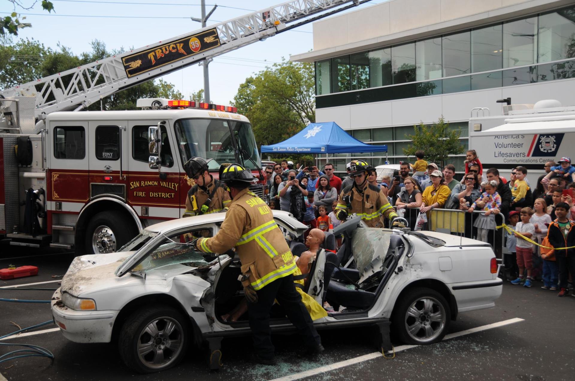 Firefighters using Jaws of Life on Car